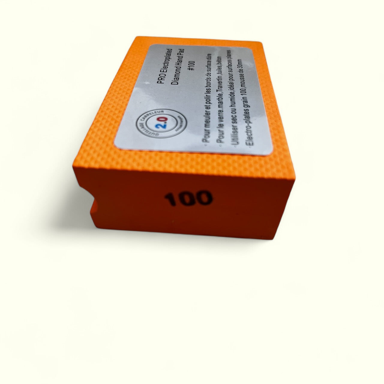 Cale diamantée orange grain 100 avec bloc mousse ergonomique pour finitions de carrelage et pierre