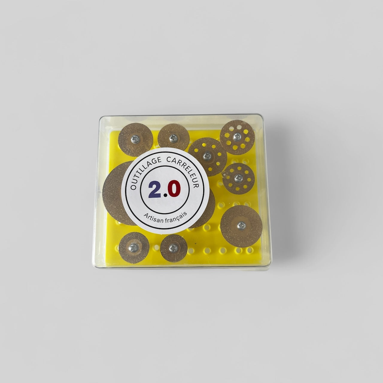 Boîte transparente contenant 10 mini disques diamantés or pour découpe de carrelage et faïence